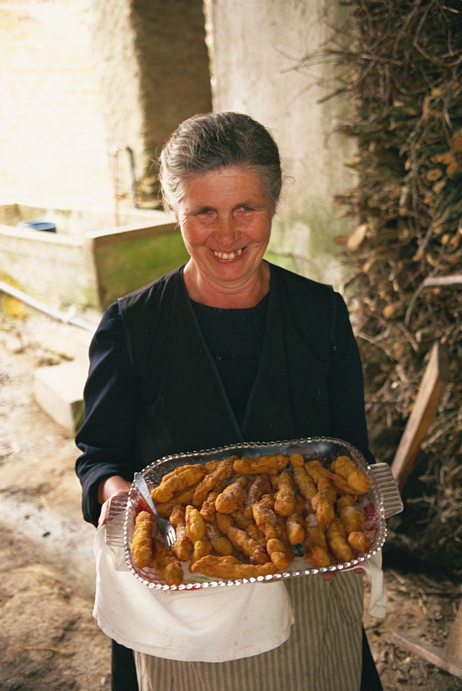 Lady with homemade churros, Lugo, Galicia, Spain, Europe