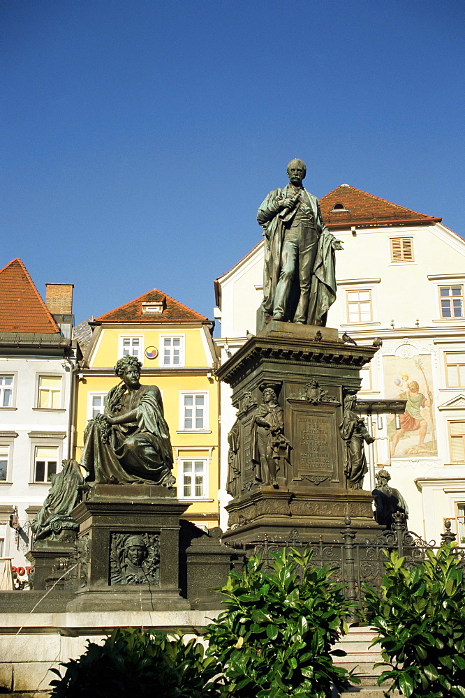 Statue of Archduke Johann, moderniser of Graz, and nymphs at base symbolising Styria's rivers, Hauptplatz, Graz, Styria, Austria, Europe