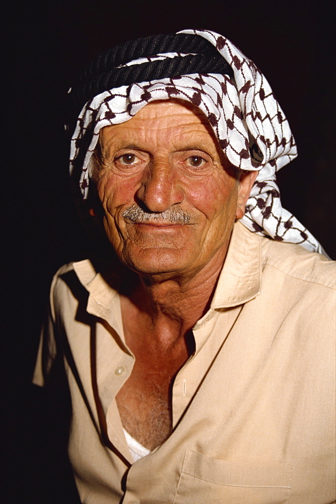 Portrait of an elderly man wearing a traditional headcloth, a guardian at the Folklore Museum, Amman, Jordan, Middle East