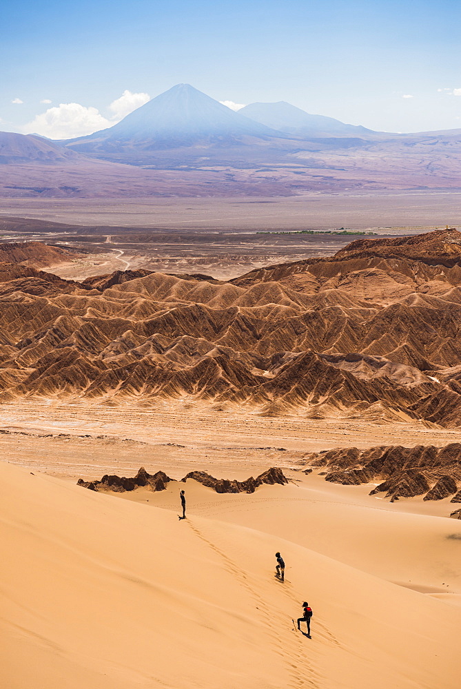 Tourists in sand dunes at Death Valley (Valle de la Muerte), San Pedro de Atacama, Atacama Desert, North Chile, Chile, South America