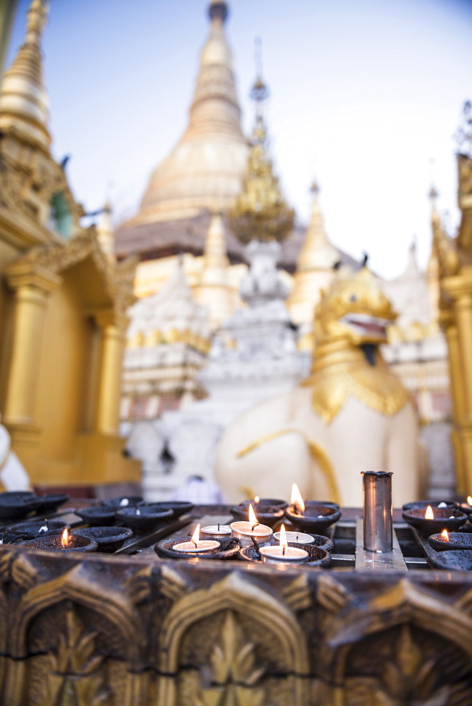 Burning candles at Shwedagon Pagoda (Shwedagon Zedi Daw) (Golden Pagoda), Yangon (Rangoon), Myanmar (Burma), Asia