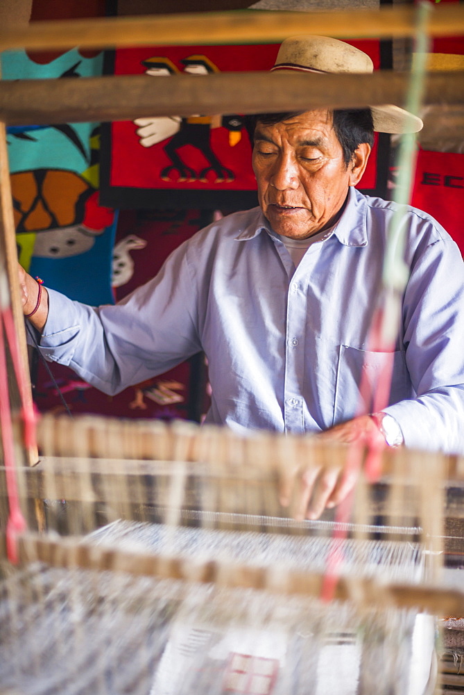 Weaver at San Antonio de Pichincha, Quito, Ecuador, South America