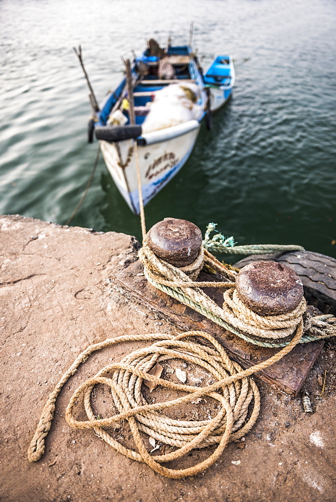 Fishing boats in a port at Talpona Beach, South Goa, India, Asia