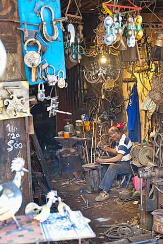 Carpenter and metalworker in his workshop in the souk, Old Medina, Marrakech, Morocco, North Africa, Africa 