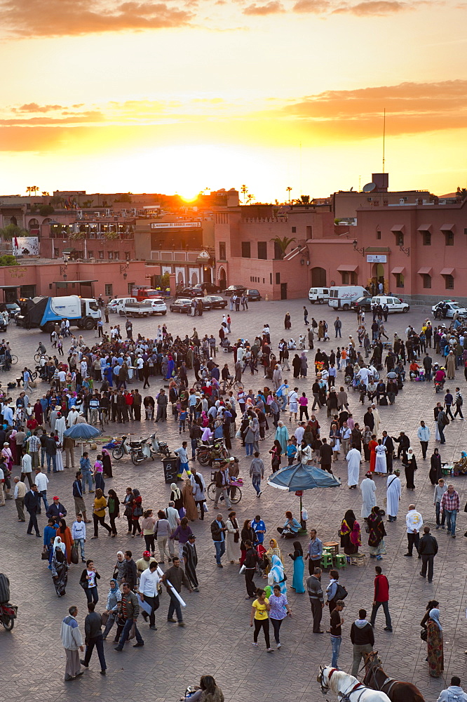 View over people in the Place Djemaa el Fna at sunset, Marrakech, Morocco, North Africa, Africa 