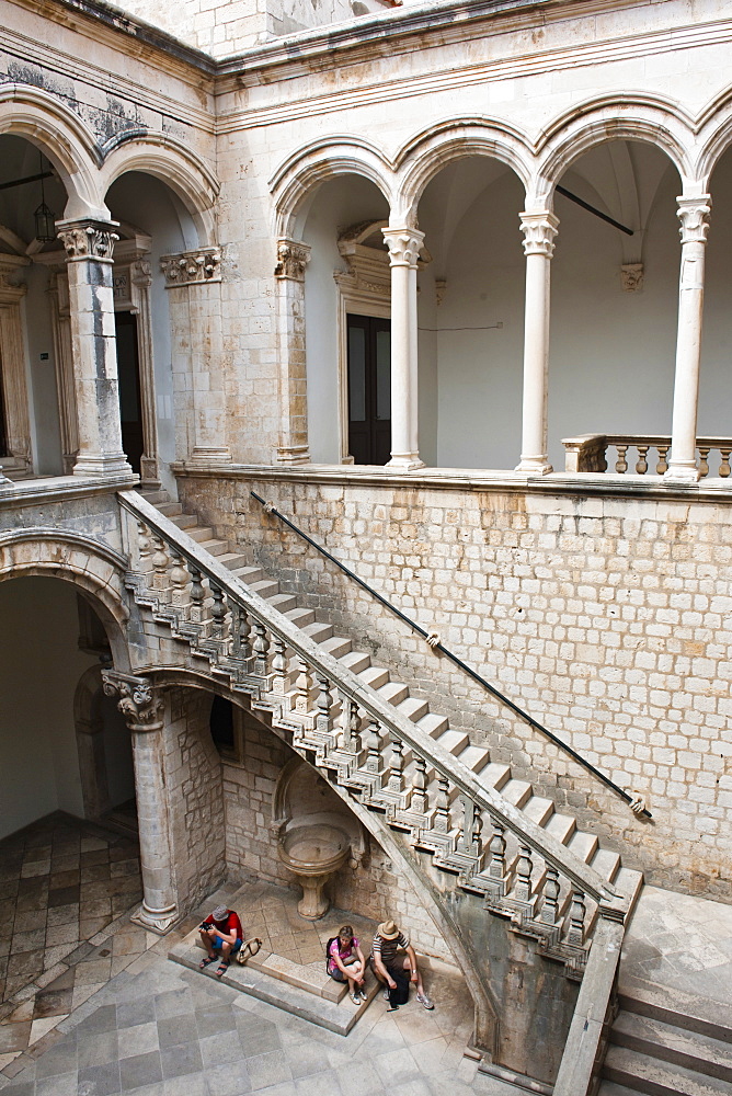 Tourists by the staircase inside the Rectors Palace, Dubrovnik, Croatia, Europe