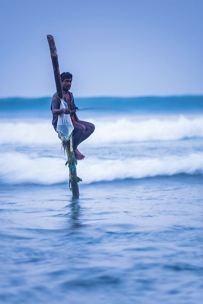 Stilt fisherman at Midigama near Weligama, South Coast, Sri Lanka, Indian Ocean, Asia 