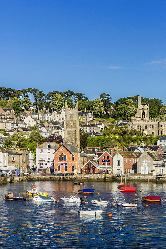 Early morning light on small boats at anchor in the harbour at Fowey, Cornwall, England, United Kingdom, Europe