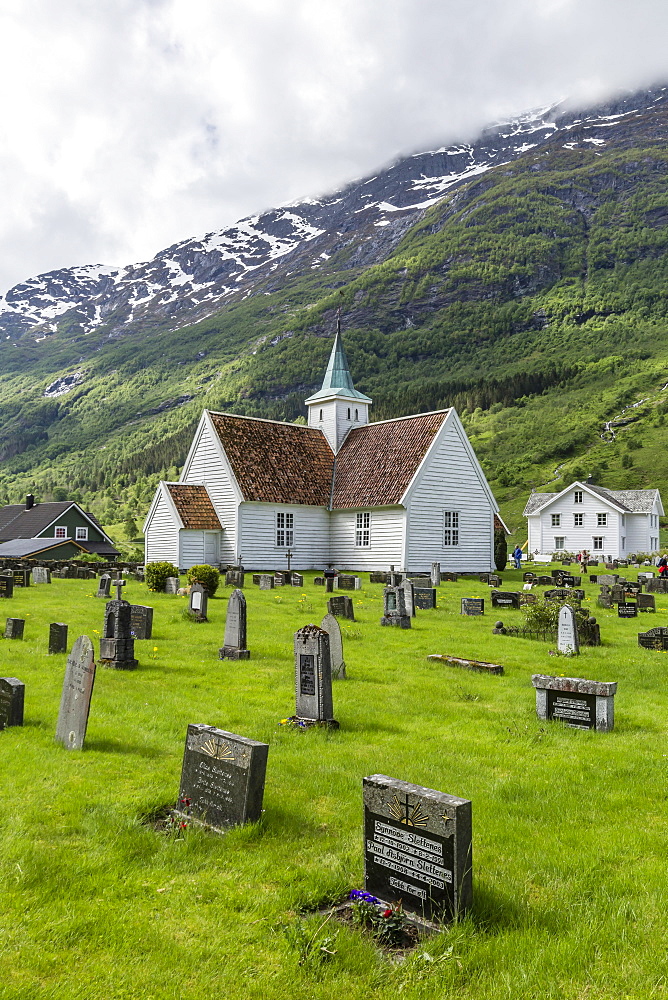 Cemetery in front of church in the town of Olden, Briksdalen, Nordfjord, Norway, Scandinavia, Europe