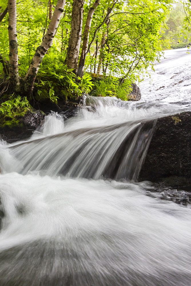 Slow shutter speed to create silky waterfall, Hellemoboten, Norway, Scandinavia, Europe 