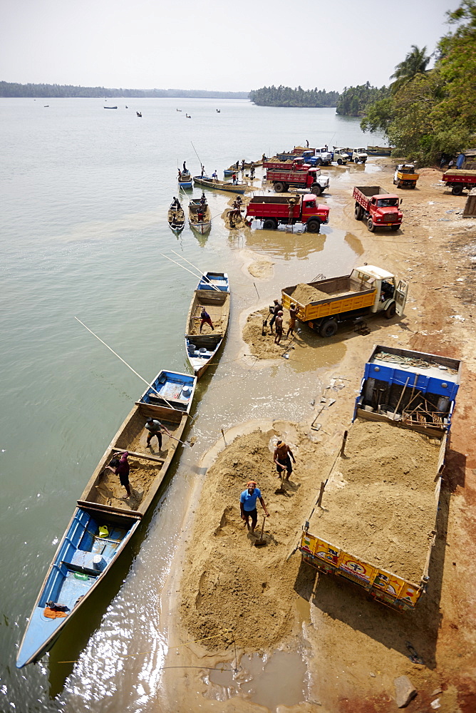 Manual sand quarrying at Sita river, Udipi, Karnataka, India