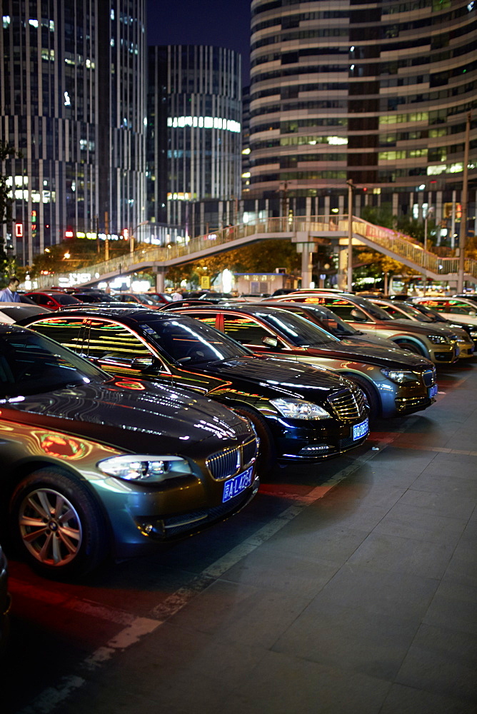 Cars in the parking lot, Sanlitun area, Chaoyang District, Beijing, China