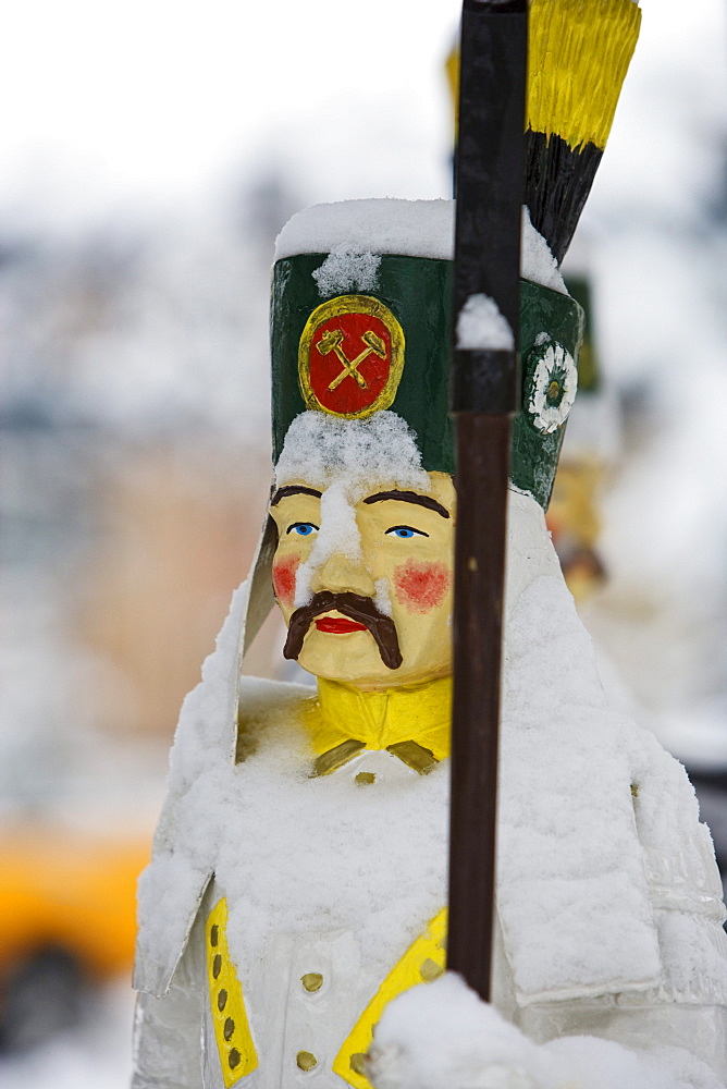 Snow-covered miner figure, Ore mountains, Saxony, germany