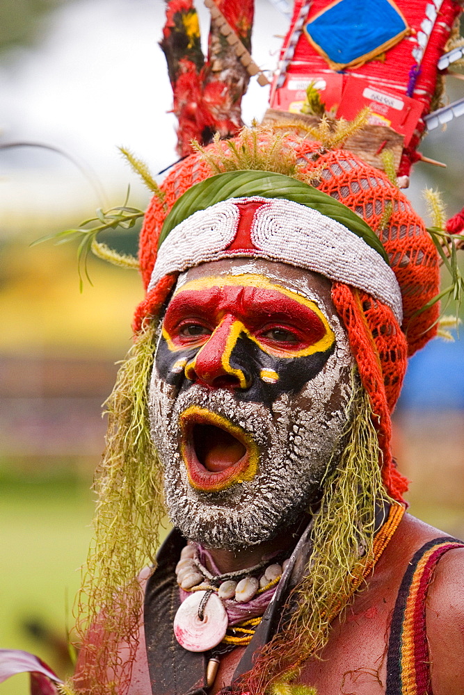 Man with facial painting at Singsing Dance, Lae, Papua New Guinea, Oceania