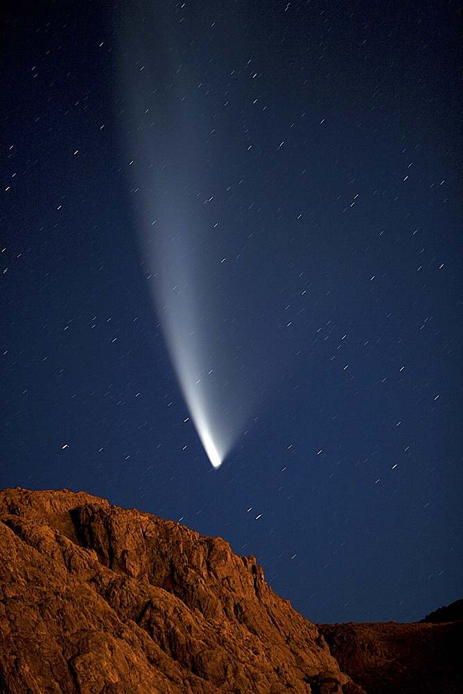 McNaught comet flying over the night sky, Patagonia, Argentina, South America