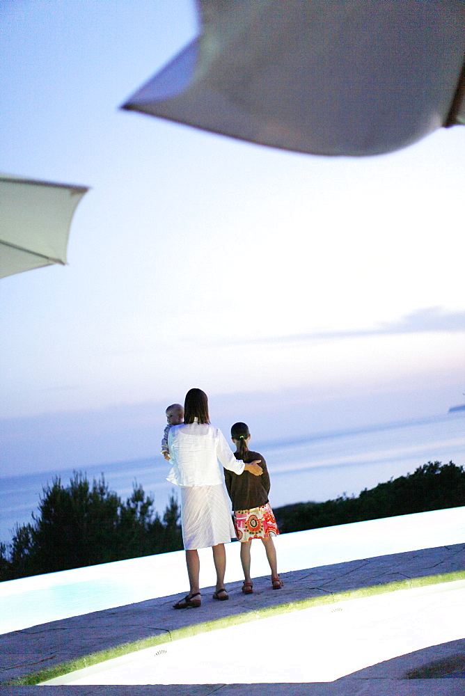 Mother with daughters at the pool, Las Dunas Playa, Formentera, Balearic Islands, Spain