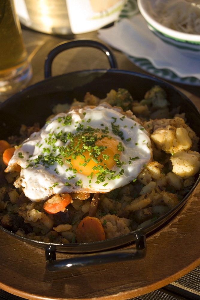 Regional delicacy (potato pan) served in restaurant, Schladming, Ski Amade, Austria