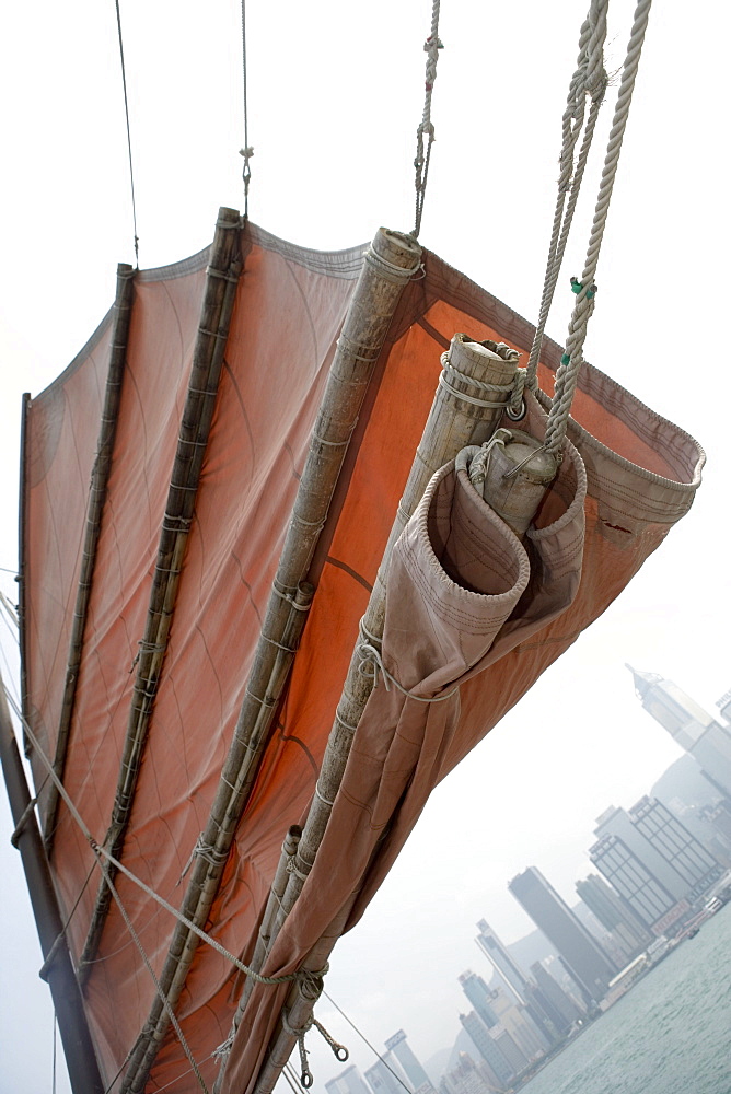 Traditional Junk Sail & Skyline,Hong Kong Harbour, Hong Kong