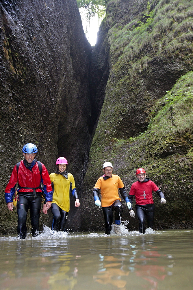 Man swim and hike canyoning, Raebloch, Emmental valley, Canton of Bern, Switzerland, MR