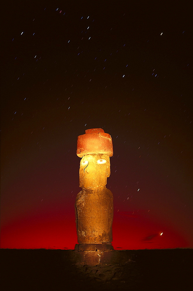 Illuminated statue in the evening, Moai Ko Te Rilku, Tahai, Easter Island, Chile, South America, America