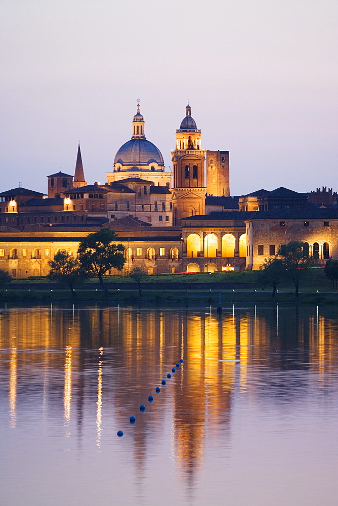 The Palazzo Ducale and the Basilica di Sant'Andrea at a lake in the evening, Mantua, Lombardy, Italy, Europe