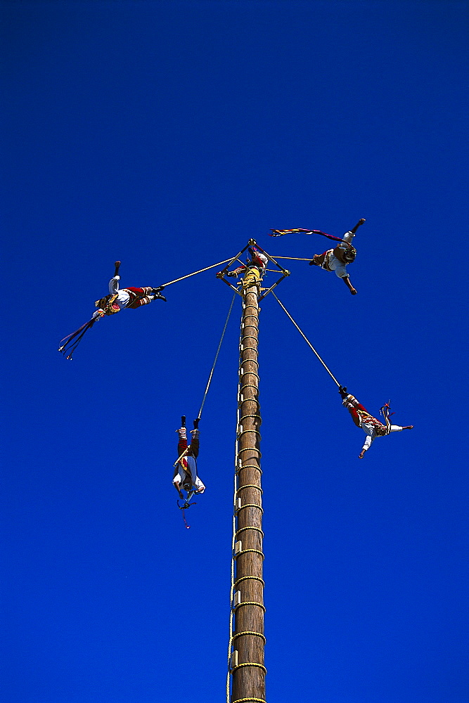 Voladores de Papantia, acrobats hanging on ropes on a fun fair, Veracruz, Mexico, America