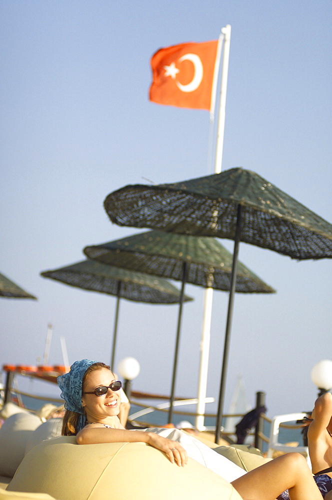 Smiling woman at beach, Turkey