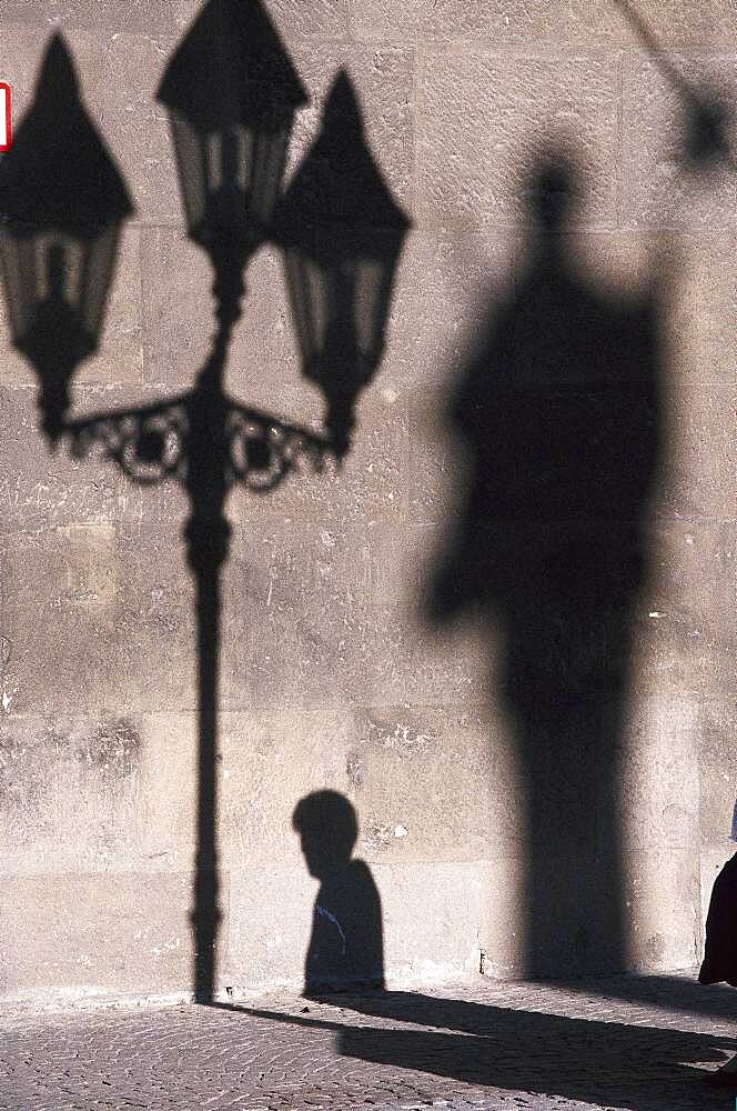 Shadow play on a wall, Wuerzburg, Bavaria, Germany