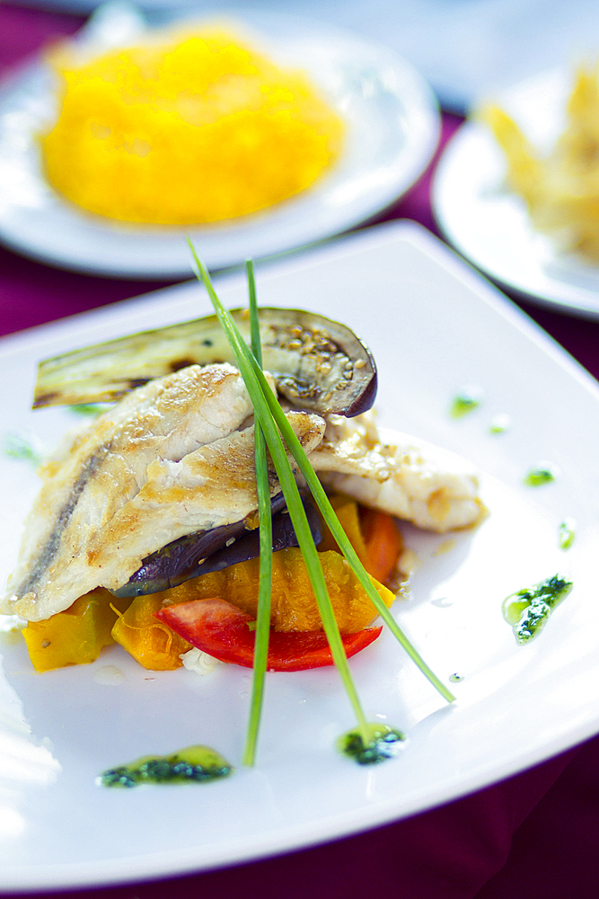 Fish and some vegetables on a plate in Havana, Cuba