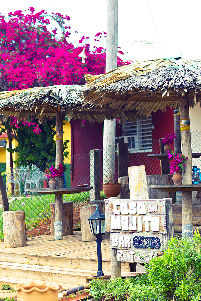 Terrace and wooden sign board of Casa del Mojito Bar in Viñales, Cuba