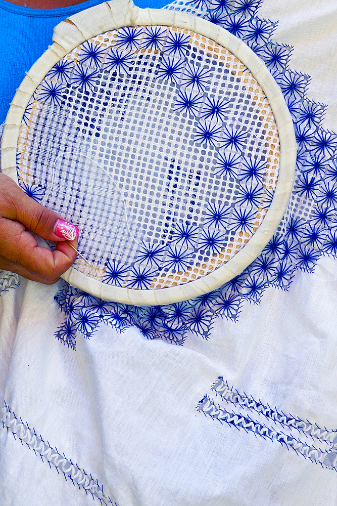 Detail of a woman who embroiders in Trinidad, Cuba