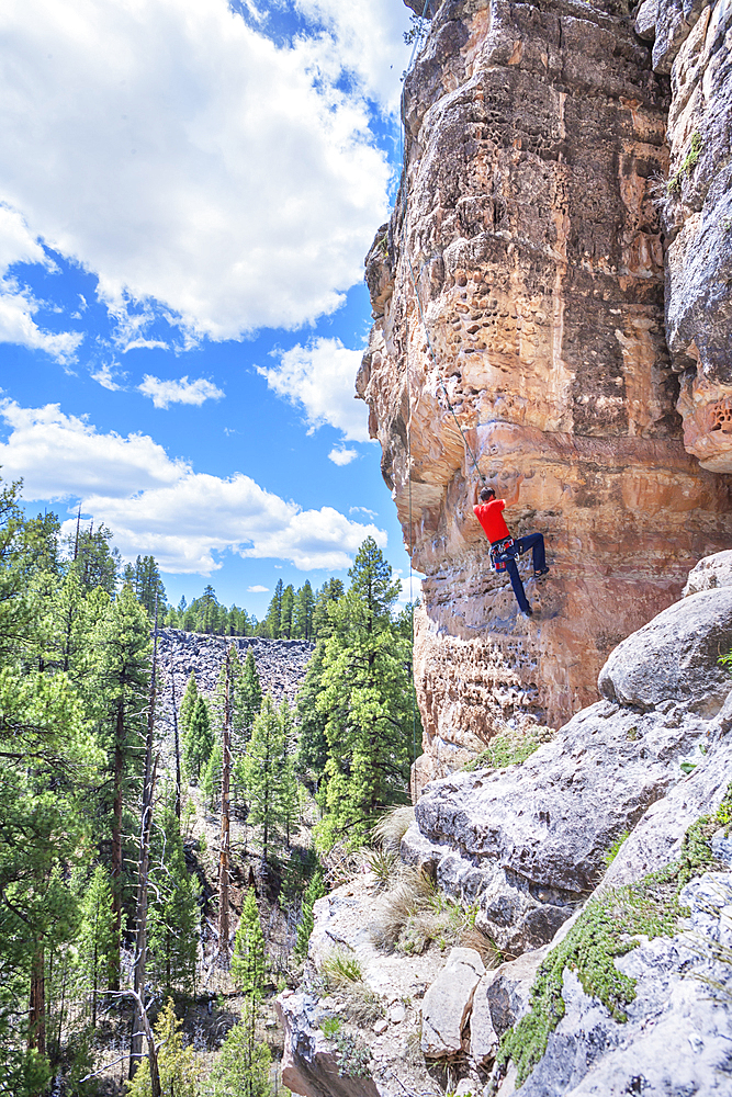 Man rock climbing at “The Pit” in Sandy’s Canyon, Flagstaff, Arizona, USA