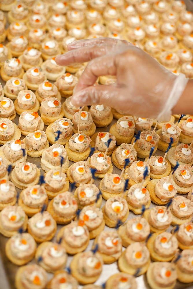 Cook preparing the desserts in the galley, ships kitchen, cruise liner, Queen Mary 2