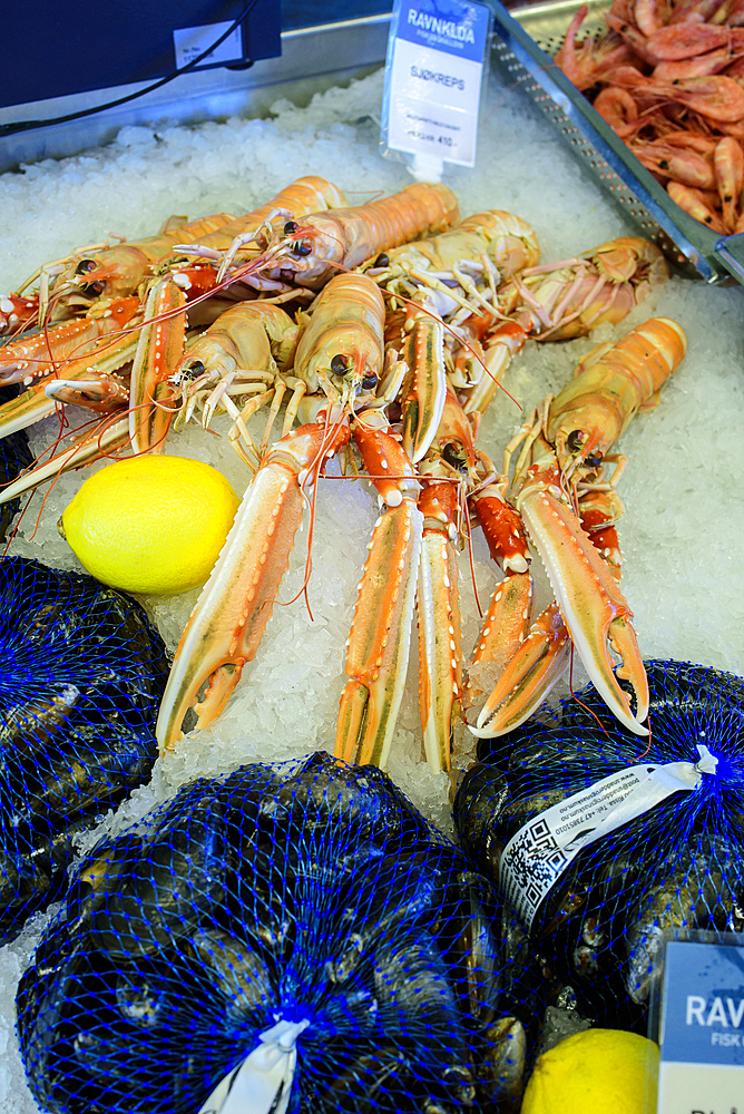 Shellfish in the sales counter in the Ravnkloa fish hall, Trondheim, Norway