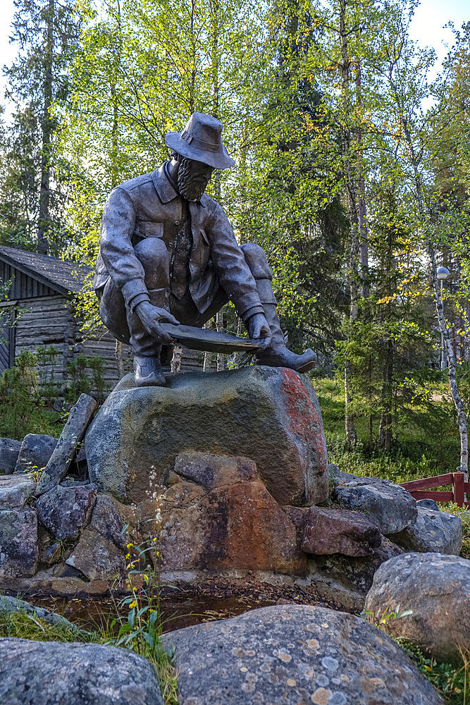 Gold Miners', Museum, Kemi sculptor Ensio Seppännen created the bronze statue of a gold panner in Gold Miners', Village, Tankavaara, Finland