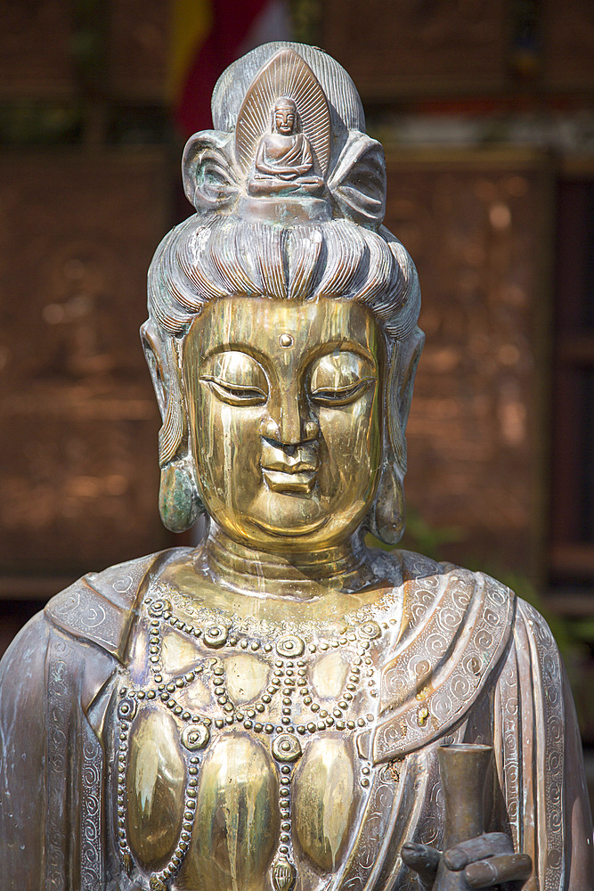 Brass Buddha figure, Gangaramaya Buddhist Temple, Colombo, Sri Lanka, Asia