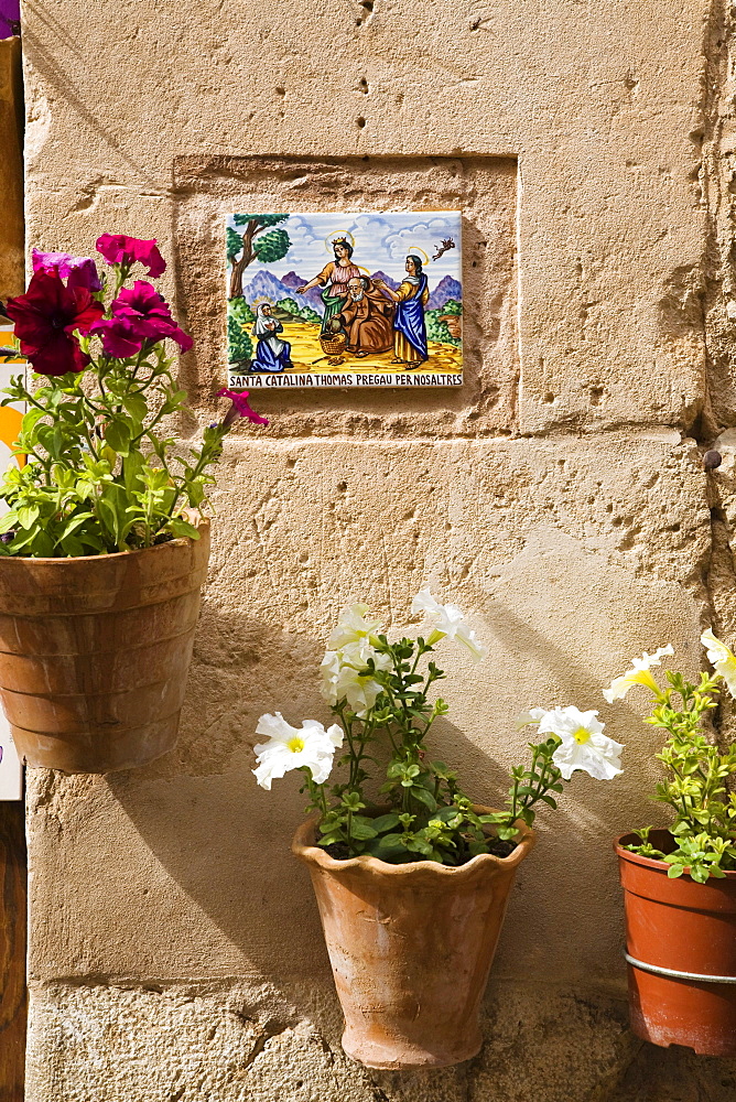 Ceramic tile with Saint Catalina on a wall at Valldemossa, Tramuntana Mountains, Mallorca, Balearic Islands, Spain, Europe