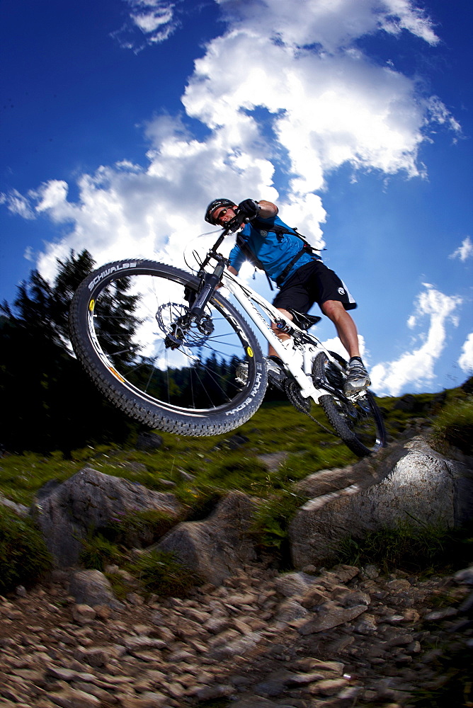 Man riding mountain bike, Spitzingsee, Bavaria, Germany