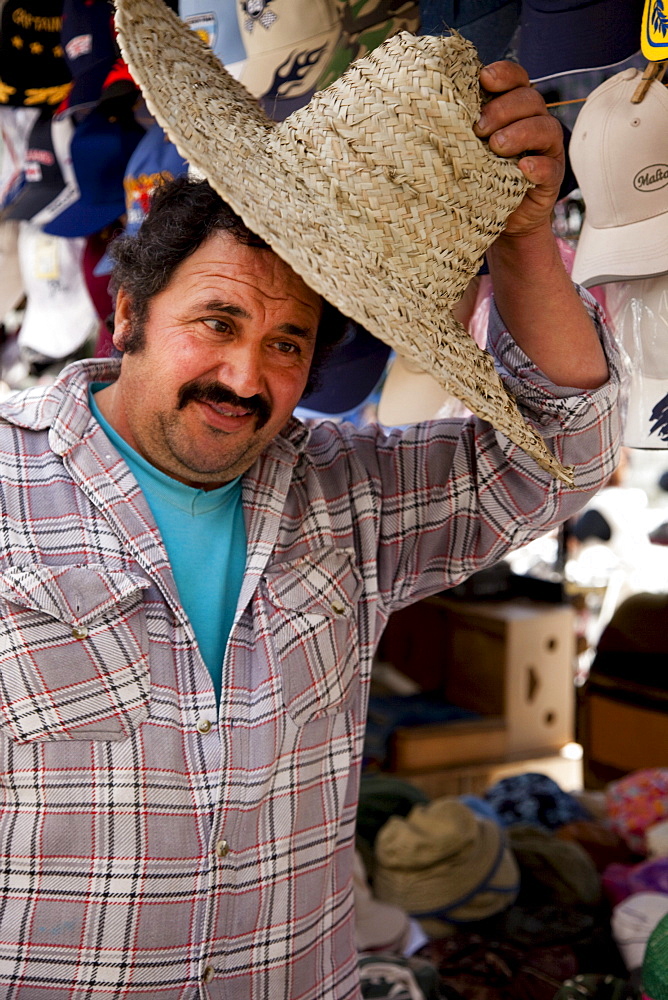 A vendor with a traditional maltese hat, Victoria, Gozo, Malta, Europe