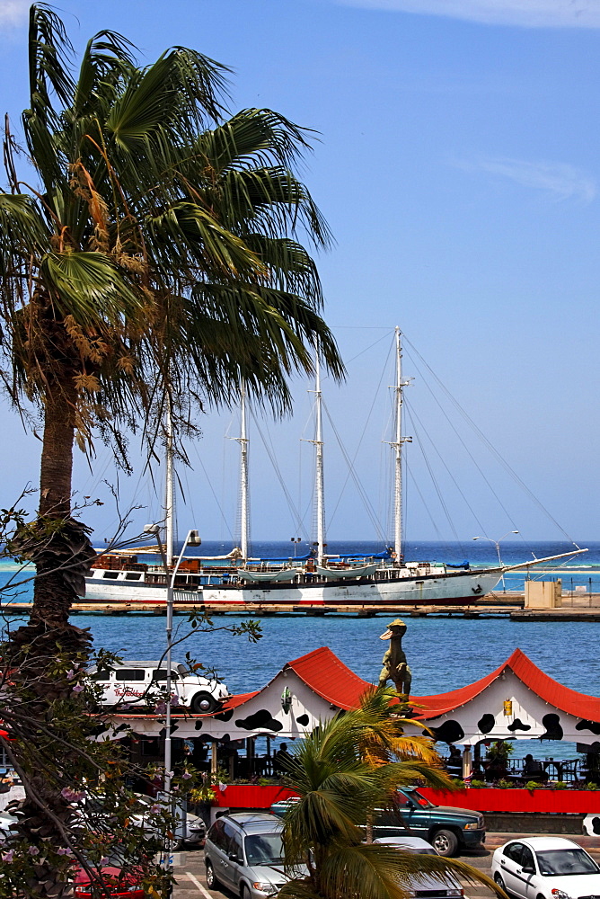 West Indies, Aruba, Oranjestadt, Bar Cafe The Paddock, Dino on the roof, harbour