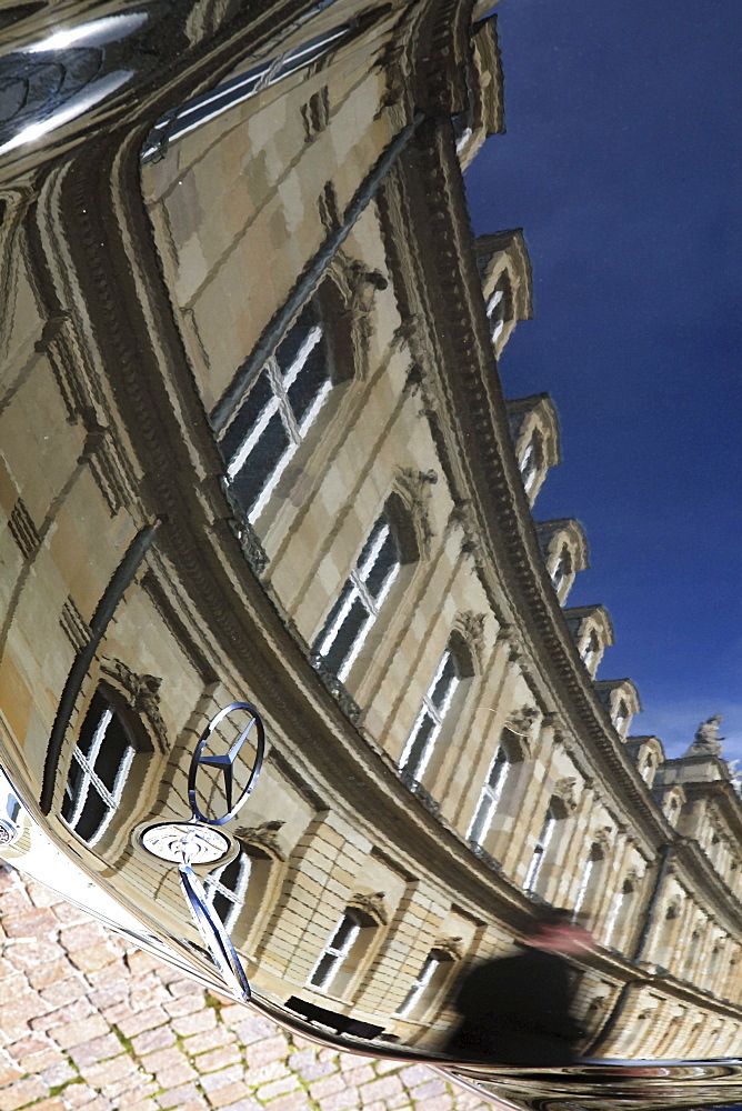 The hood of a Mercedes Benz reflecting the New Castle, Stuttgart, Baden-Wuerttemberg, Germany