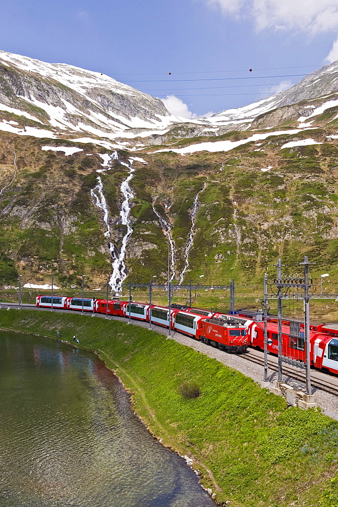 Train passing a lake, Mountain landscape, Furka Pass, Switzerland