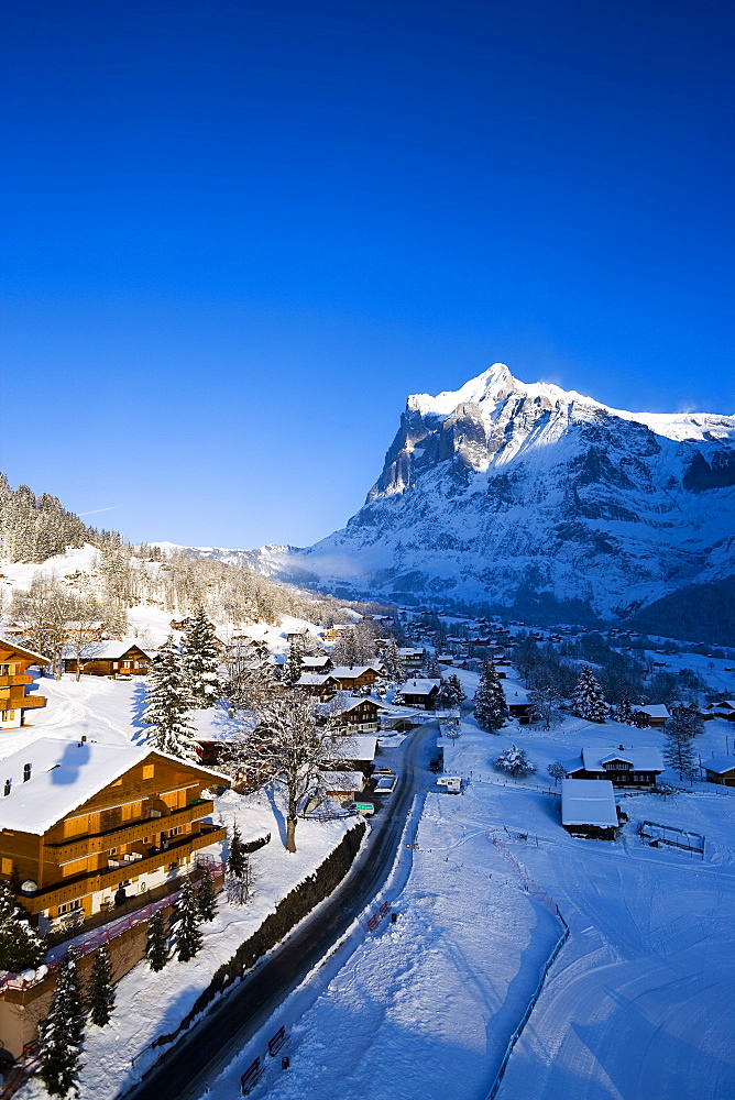 View over Grindelwald with mountain Wetterhorn in background, Grindelwald, Bernese Oberland, Canton of Bern, Switzerland