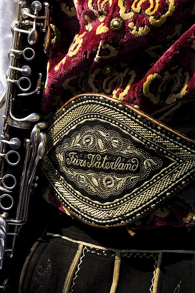 Detail of traditional costume in Kastelruth, man with clarinet, music band, Kastelruth, South Tyrol, Italy