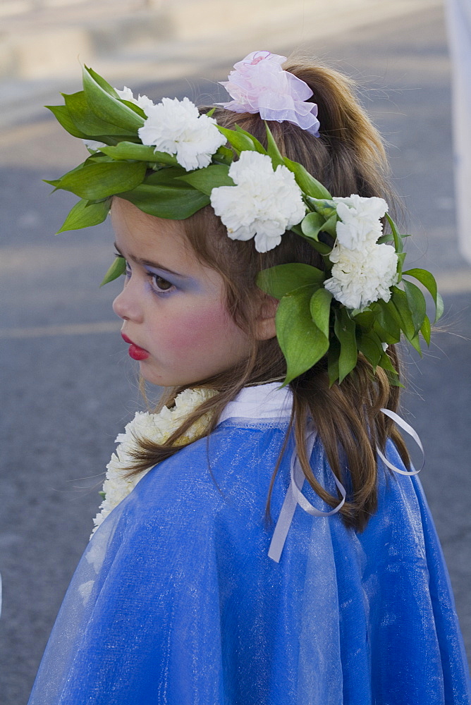 Young girl at the Anthesteria Flower Festival, parade, Germasogeia, Limassol, South Cyprus, Cyprus