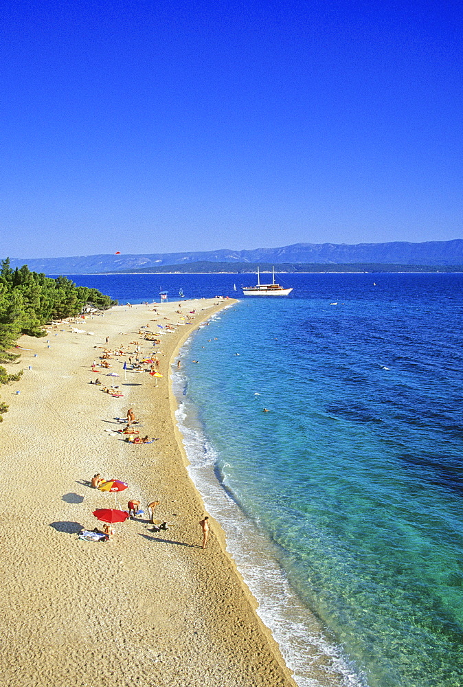 People on the beach on a tongue of land under blue sky, Golden Horn, Brac island, Croatian Adriatic Sea, Dalmatia, Croatia, Europe