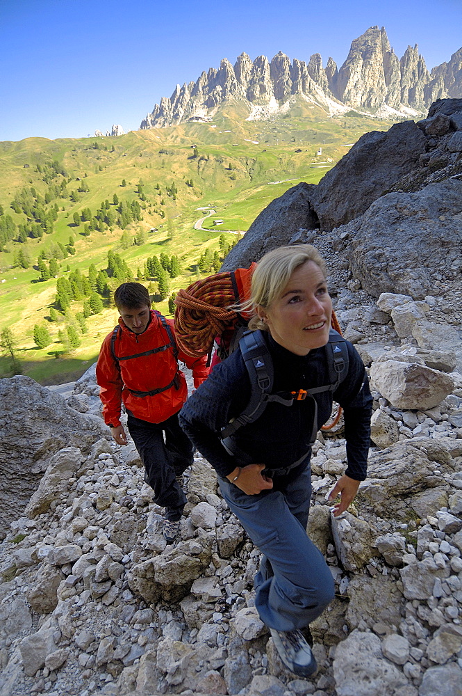 Two hikers at the ascent, Dolomites, South Tyrol, Italy, Europe