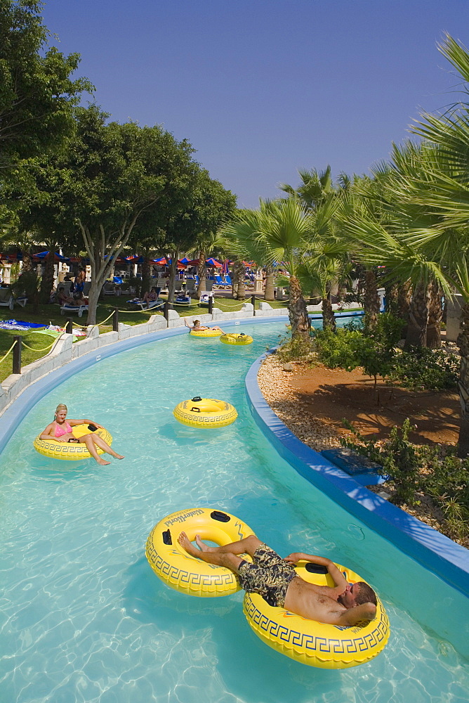 People floating in rubber tyres, WaterWorld, waterpark, Agia Napa, South Cyprus, Cyprus