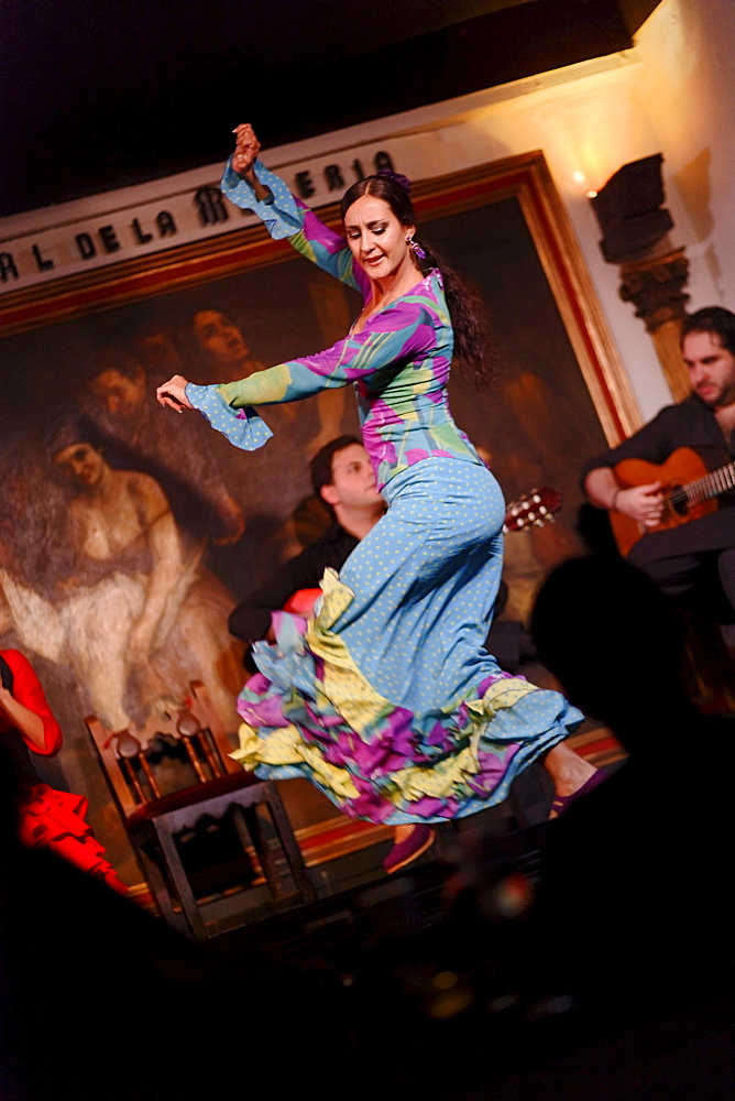 Woman dancing flamenco in the flamenco restaurant Corral de la Maoreira, Madrid, Spain