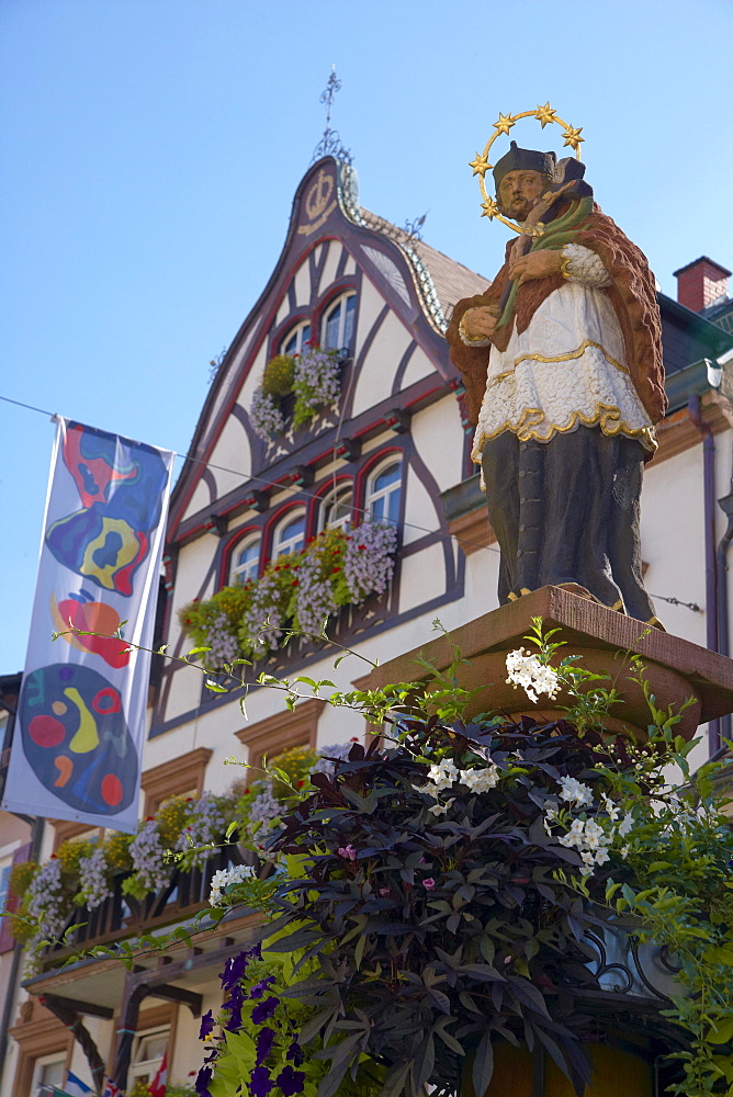 Half-timbered house and well Stadtbrunnen in the town of Wolfach, Valley Kinzigtal, Southern Part of Black Forest, Black Forest, Baden-Wuerttemberg, Germany, Europe